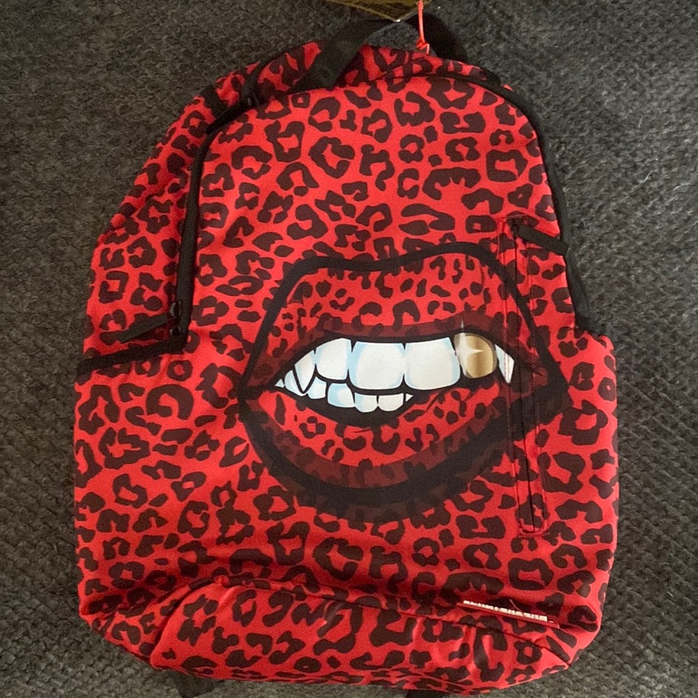 Sprayground RED LEOPARD LIPS backpack. Like new.